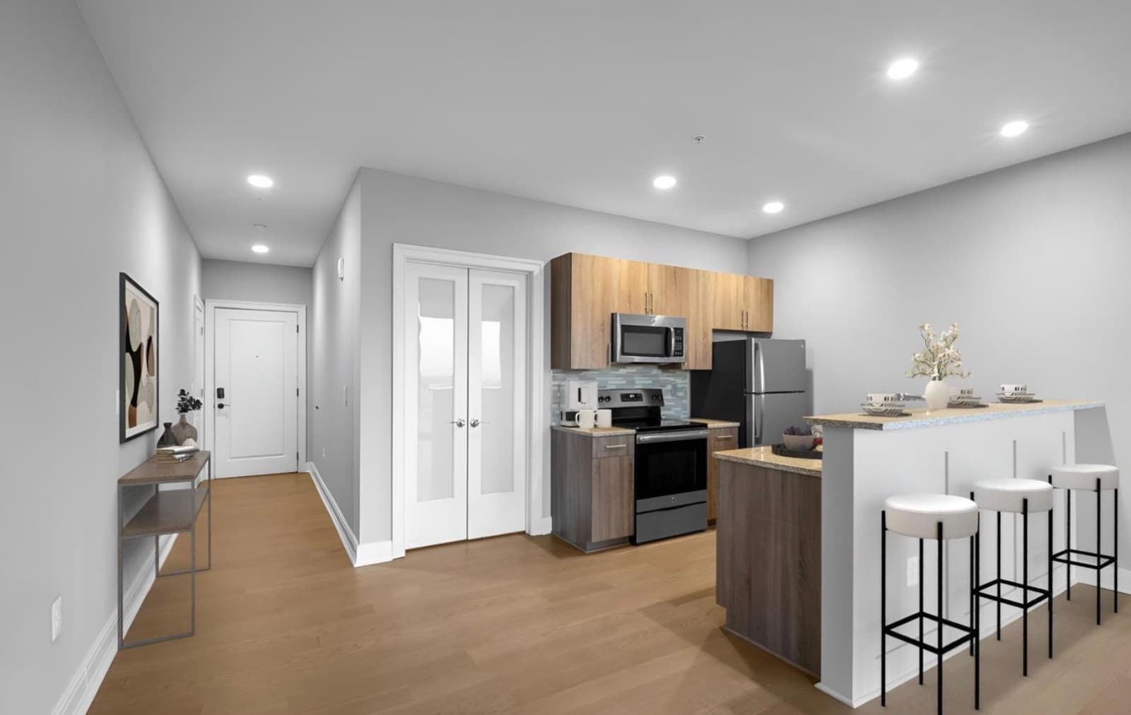 Kitchen with breakfast bar and stainless appliances