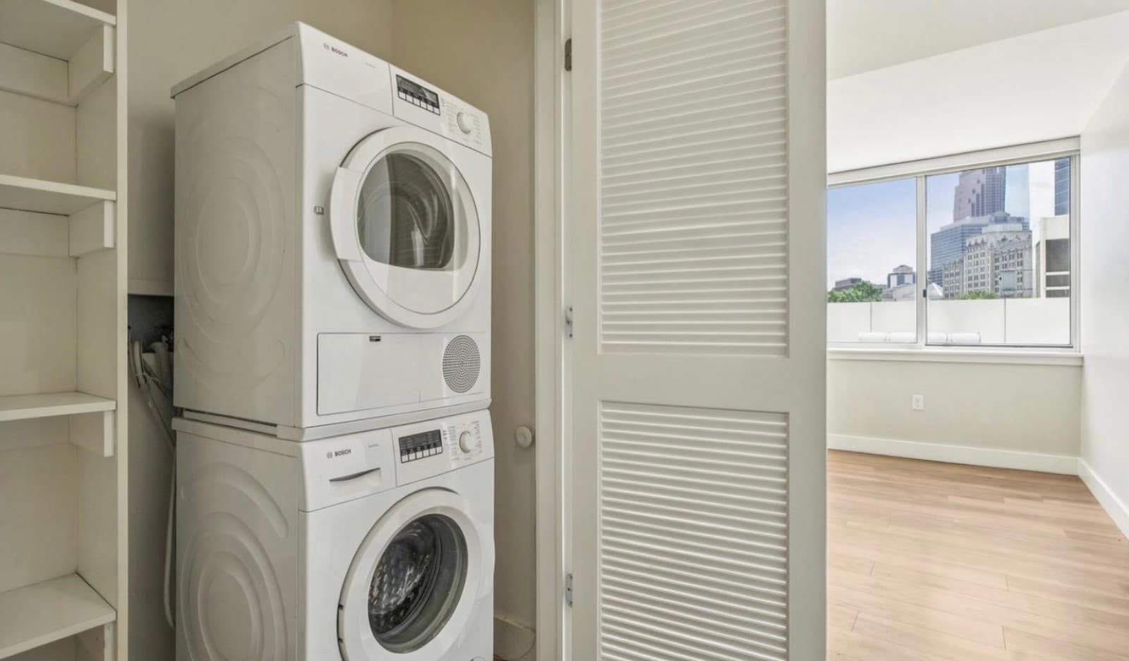 In-unit laundry with city view