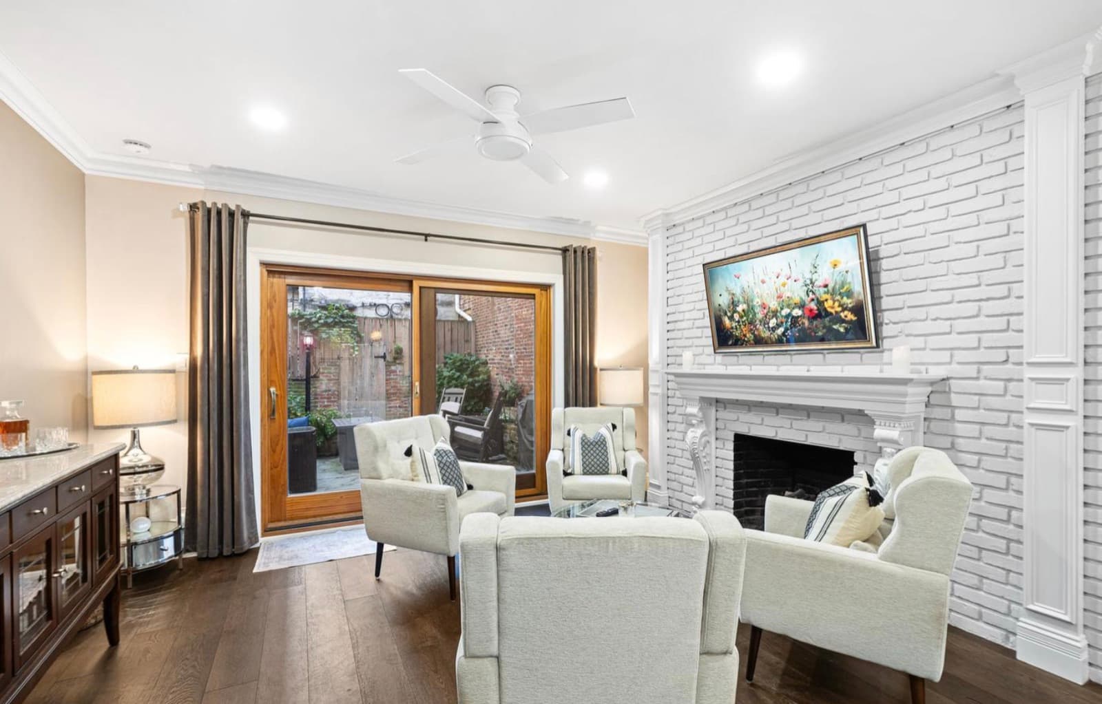 Living room opening to private patio