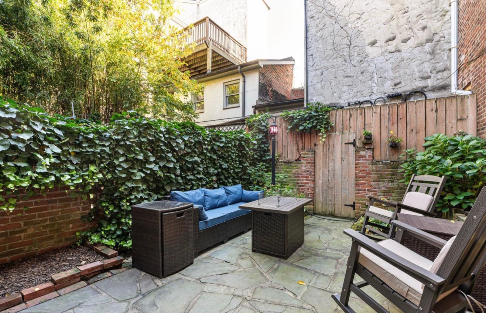 Private rear patio with seating